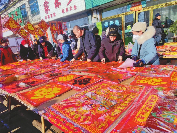 新春走基層 年貨大集上的幸福滋味